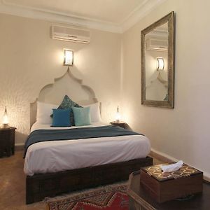 Kamer met een Queen Size Bed